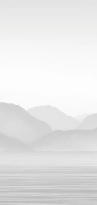 Papier peint Annecy et son lac paisible noir et blanc
